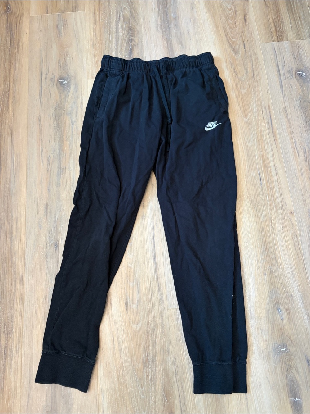 Nike Black Jogger Pants with White Swoosh Logo
